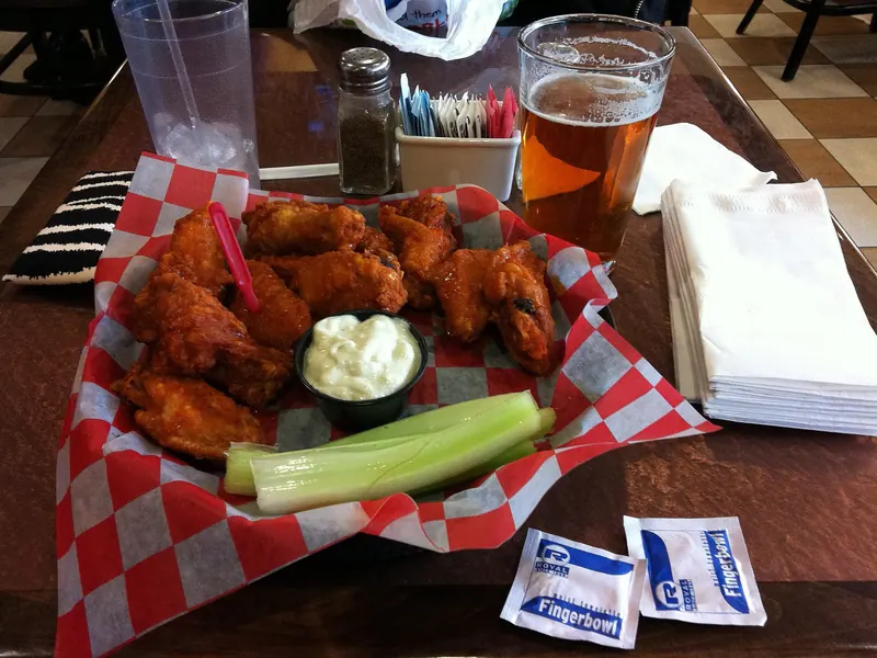 Buffalo chicken wings with celery and blue cheese dip