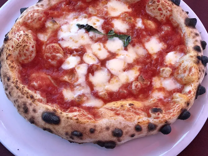 Margherita pizza with mozzarella and basil
